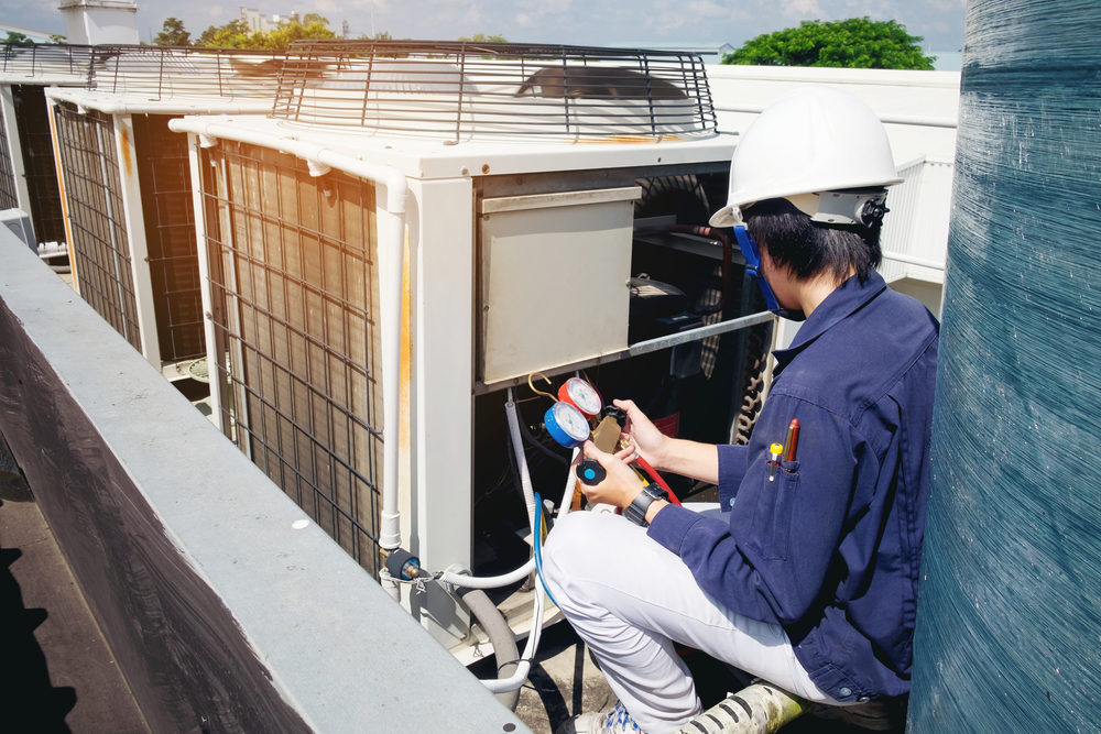 commercial HVAC repairs by technician