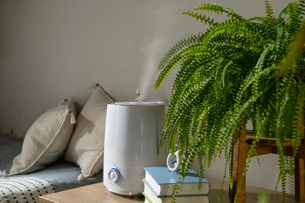 How to Control Humidity in Your Home - Charles Stone – Heating and Cooling Close up of modern air humidifier used to control humidity in house